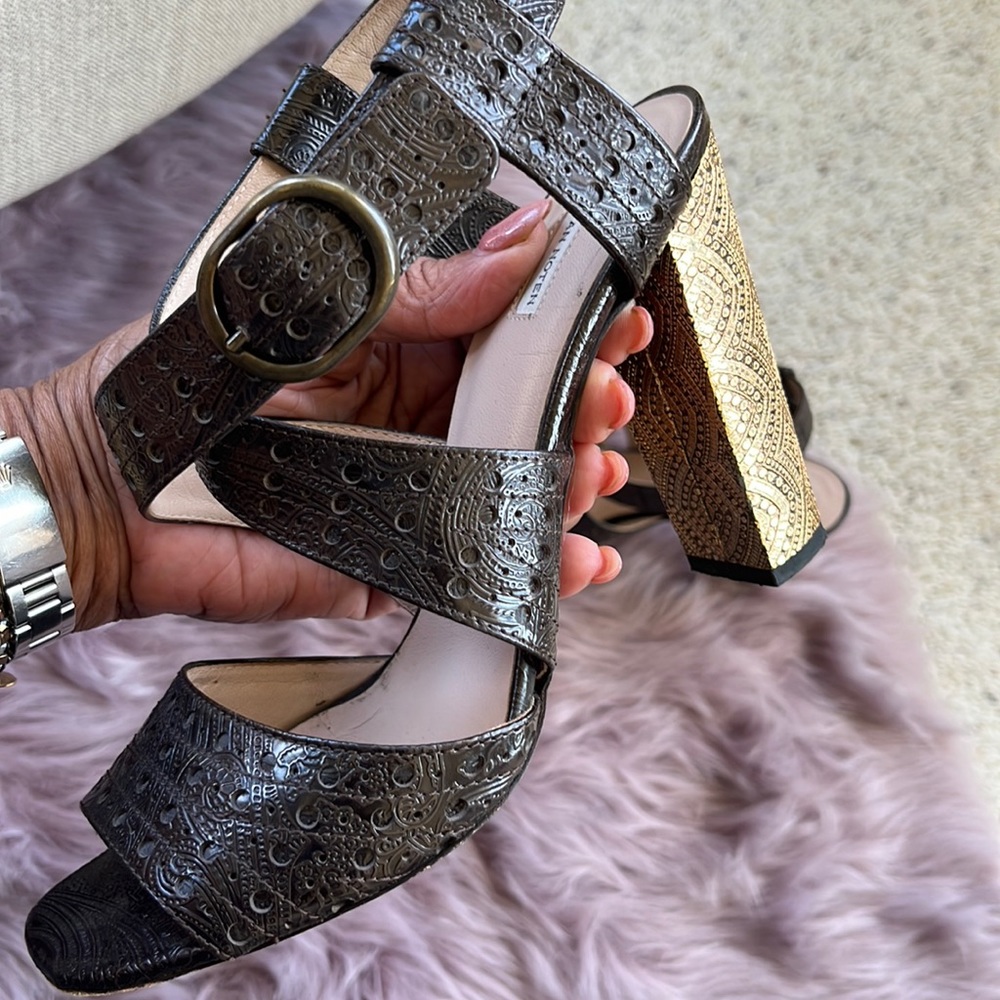 Brown leather with gold heels. Dries Van Norten